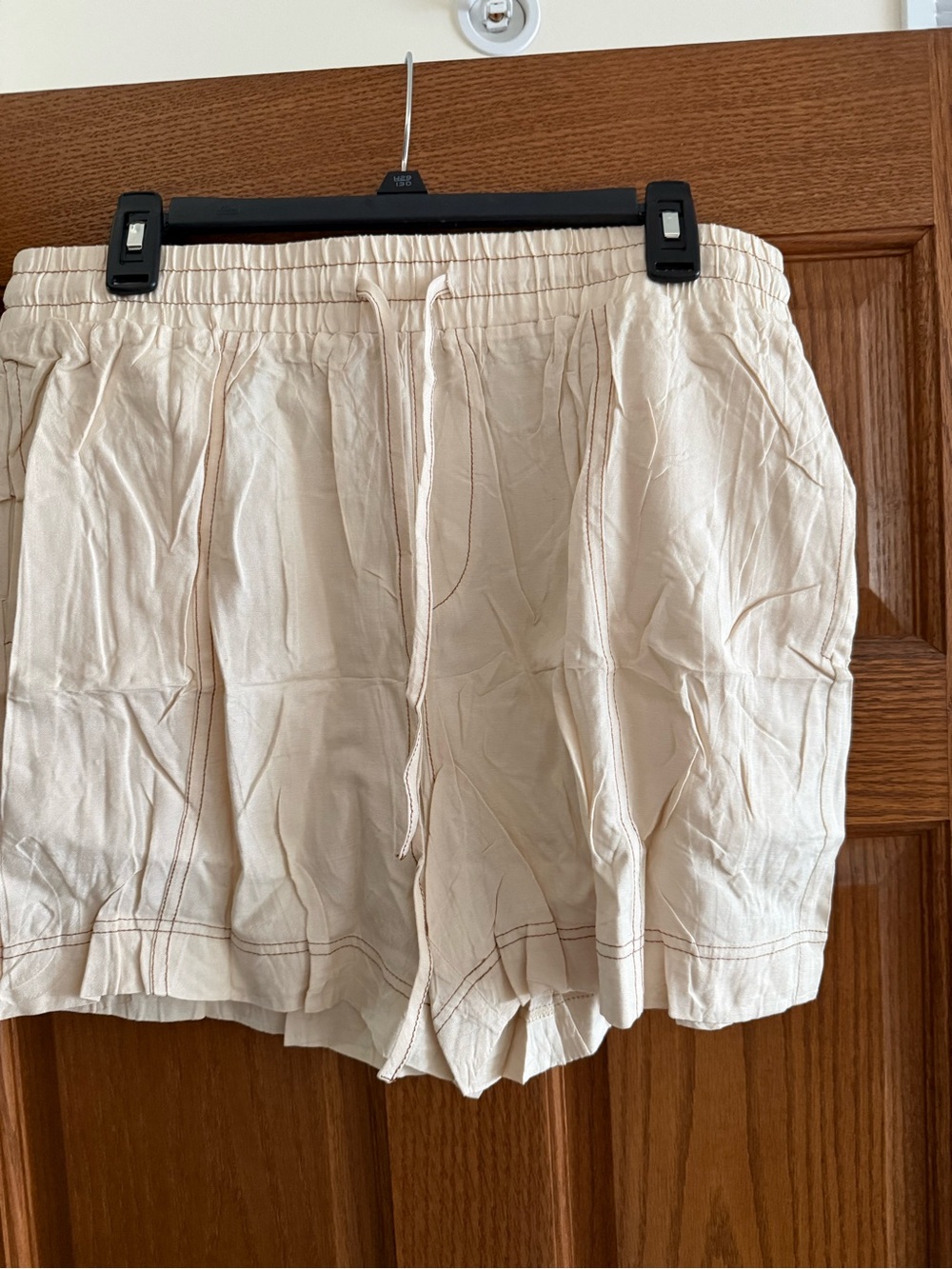 New in original packaging.  Women's Cream Elastic Waist Drawstring Shorts.  XL.
